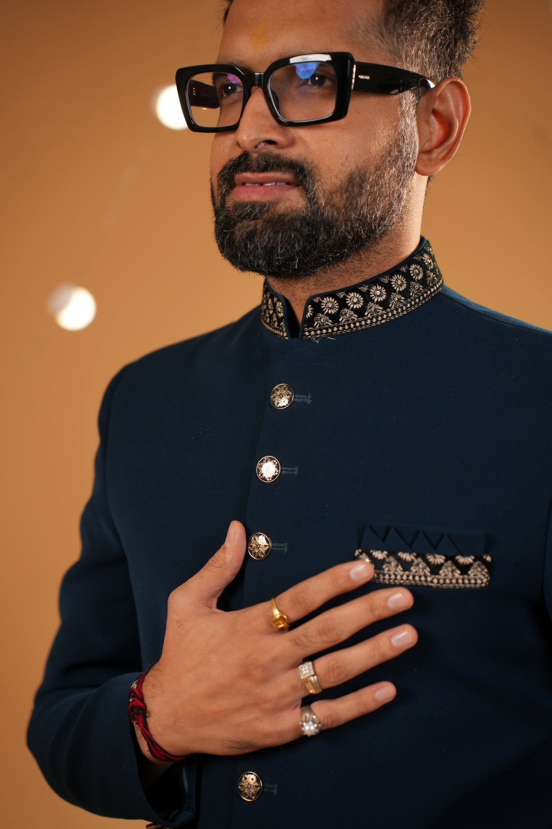 Royal Elegance: rama color Nawabi Sherwani Adorned with Red Embroidered Details