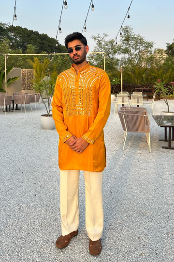 Mustard Yellow Kurta With Intricate Mirror Work For Men.