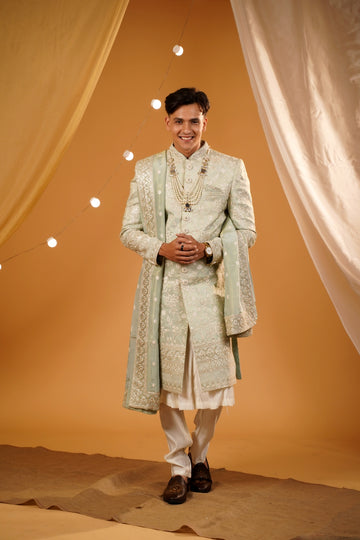 Pista floral thread embellished sherwani with matching bottom and beautiful handwork dupatta