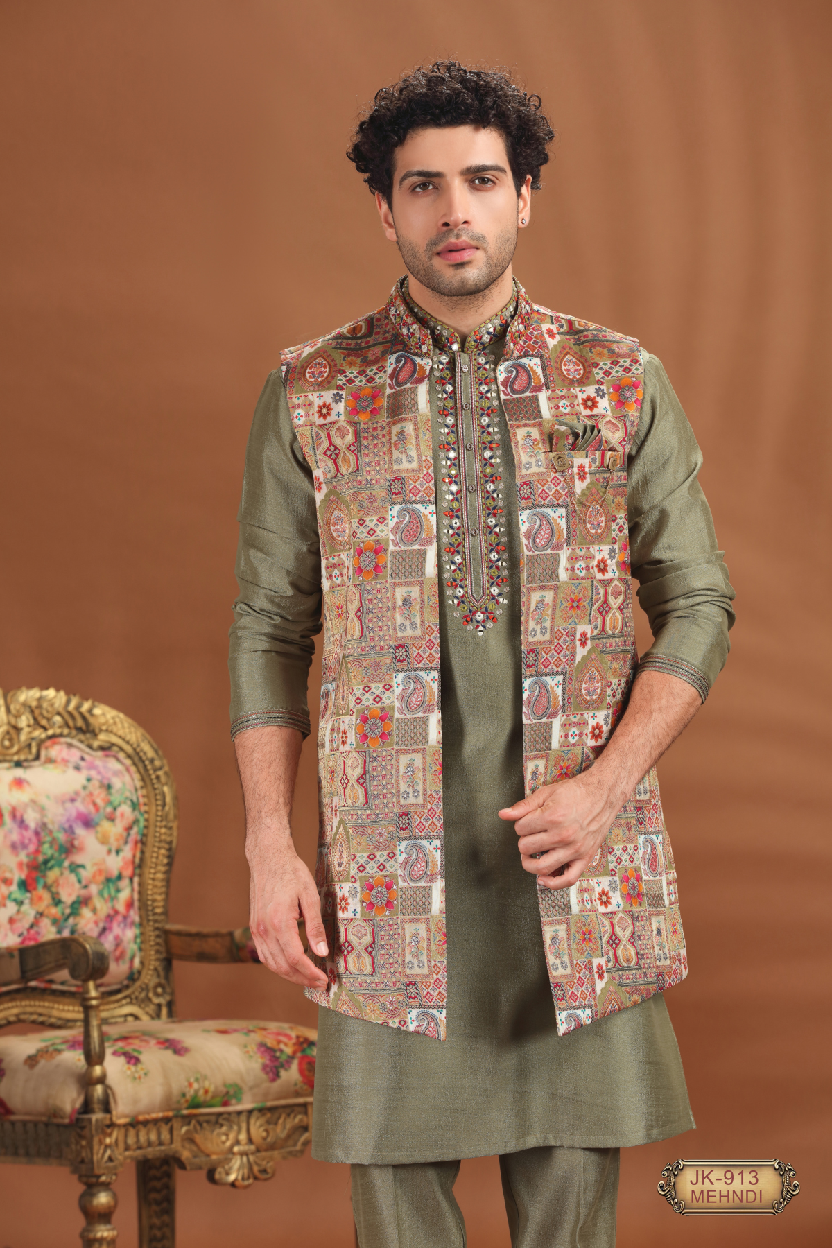 Men’s embroidered mehndi green kurta with patterned waistcoat, ethnic fashion.